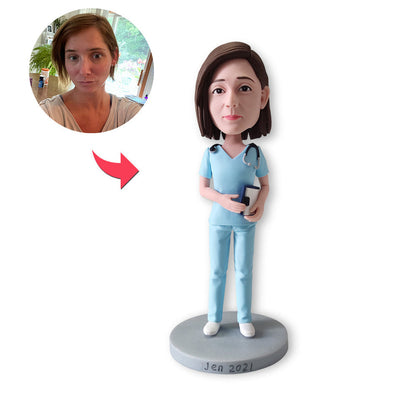 Gepersonaliseerde bobblehead verpleegster met blauw pak