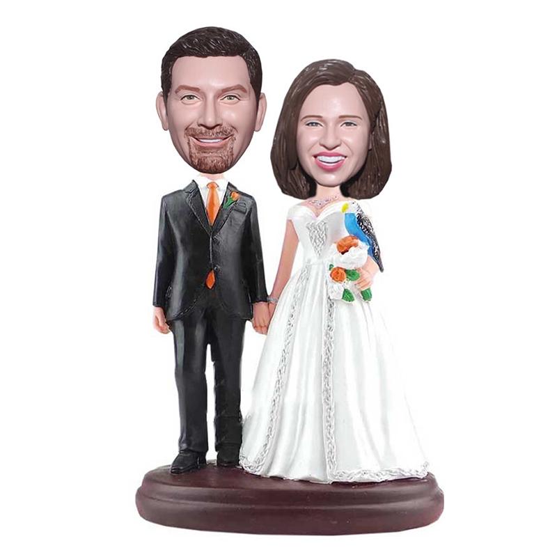 Op maat gemaakte bobblehead taarttoppers voor huwelijksbedankjes